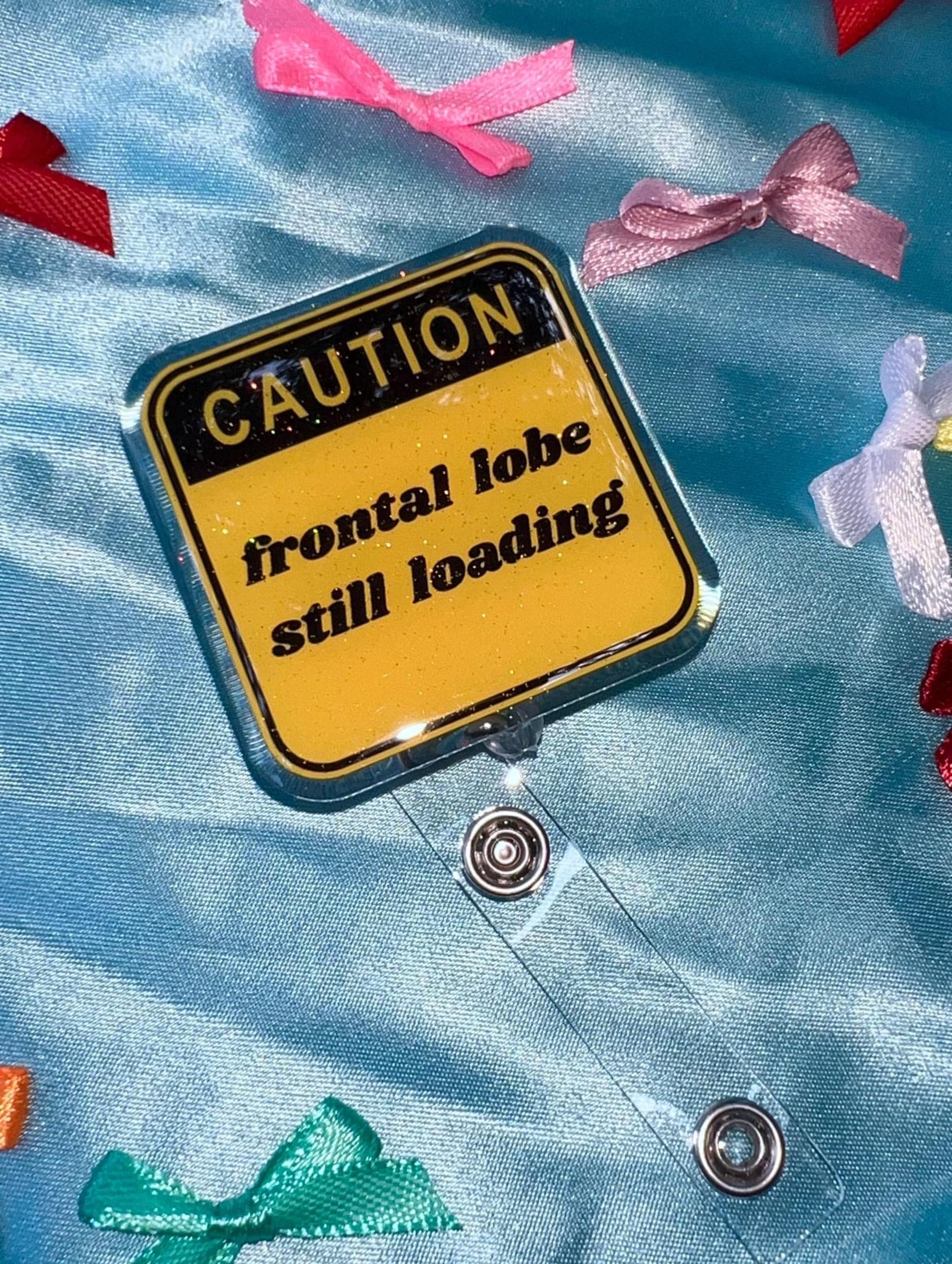 Funny "Frontal Lobe Still Loading" Glitter Badge Reel | Caution Sign Retractable ID Holder for Gen Z Nurses, Students & Teachers