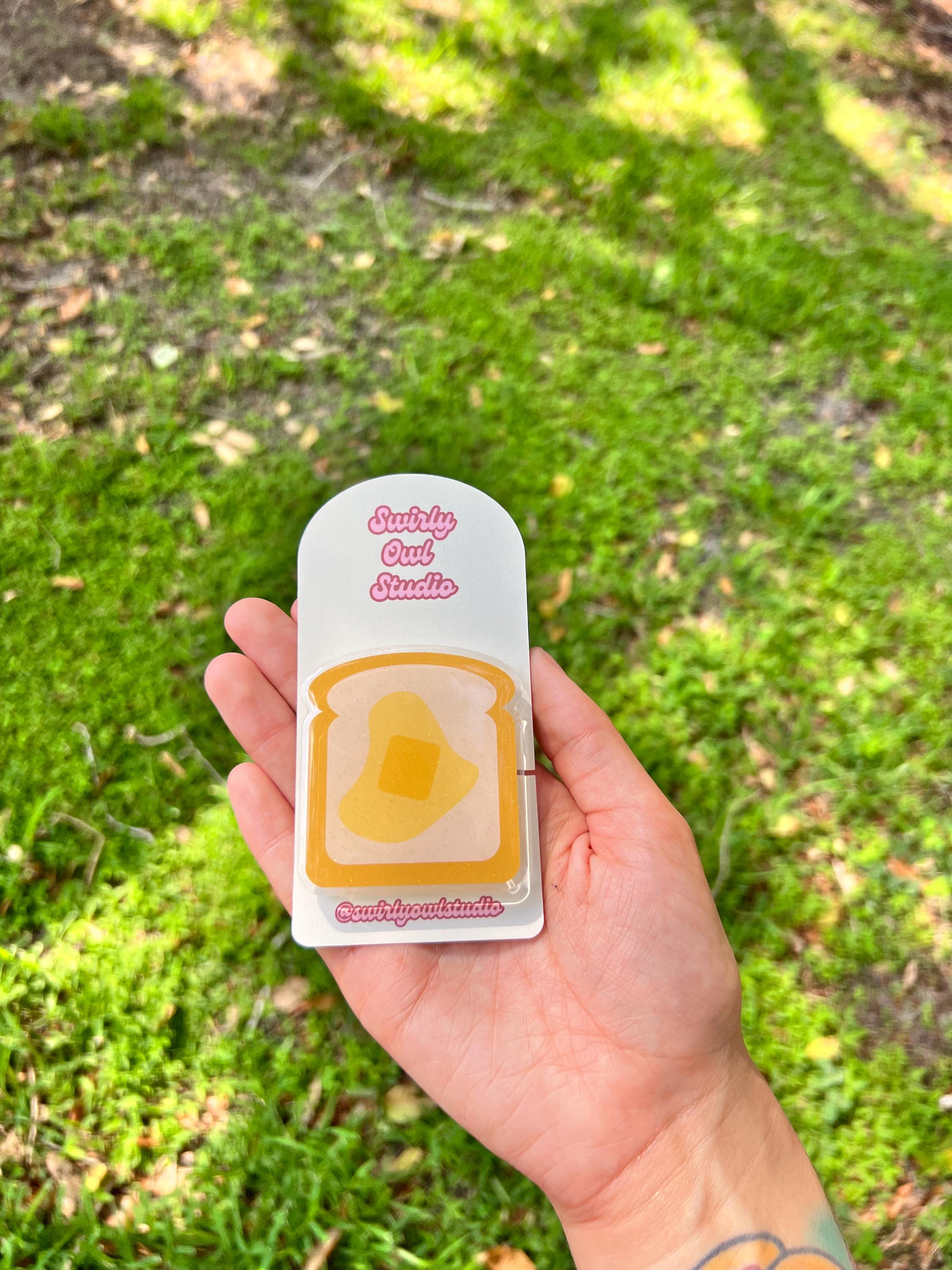 Buttered Toast Glitter Kindle/E-Reader Magnetic Grip - Cute Acrylic Phone Stand - Kawaii Food Phone Holder Gift for Bookish Lovers