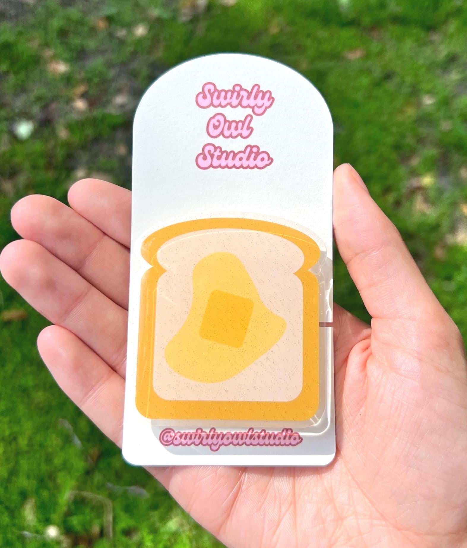 Buttered Toast Glitter Kindle/E-Reader Magnetic Grip - Cute Acrylic Phone Stand - Kawaii Food Phone Holder Gift for Bookish Lovers