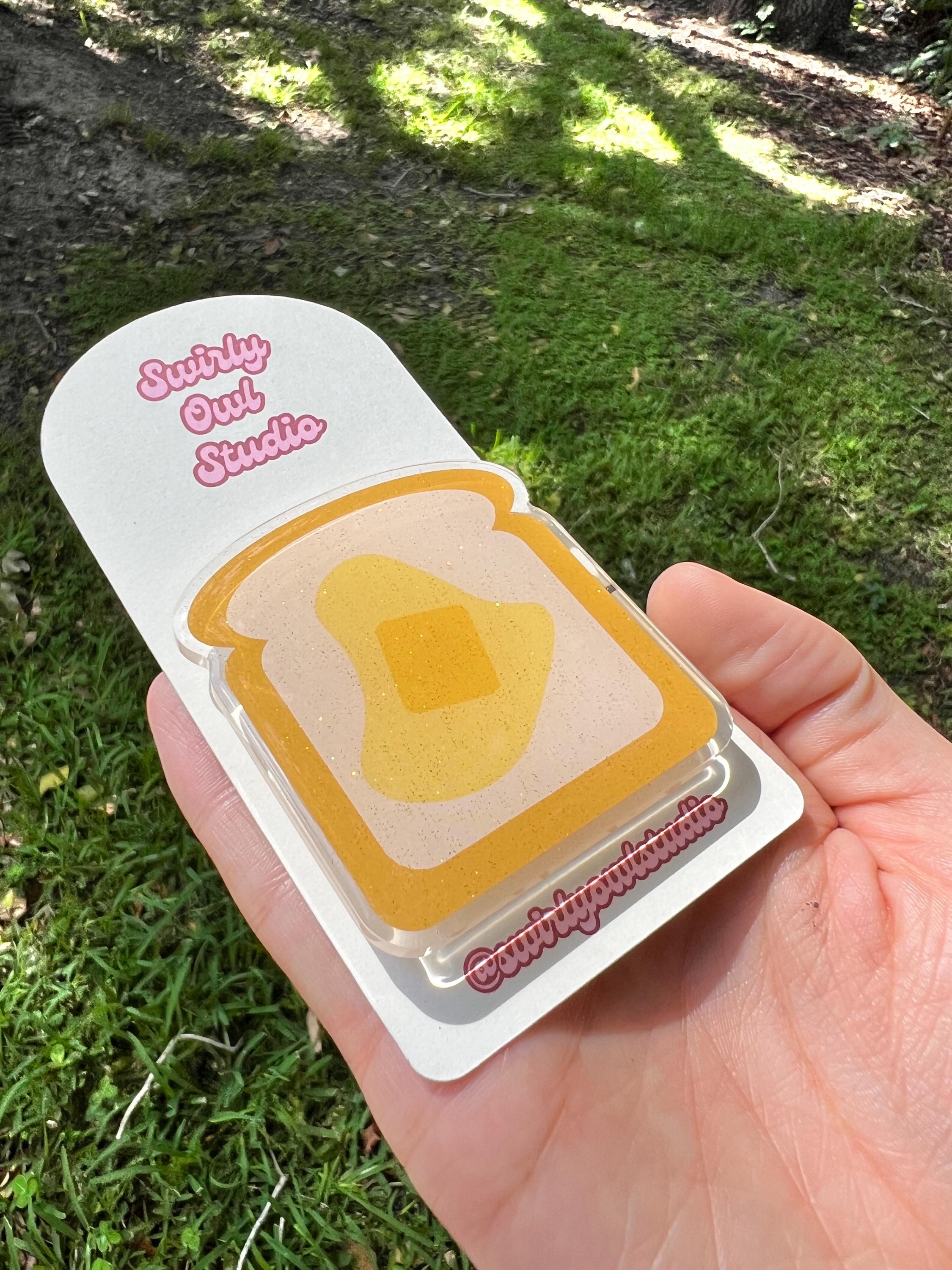Buttered Toast Glitter Kindle/E-Reader Magnetic Grip - Cute Acrylic Phone Stand - Kawaii Food Phone Holder Gift for Bookish Lovers