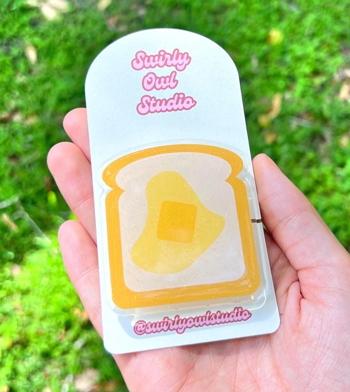 Buttered Toast Glitter Kindle/E-Reader Magnetic Grip - Cute Acrylic Phone Stand - Kawaii Food Phone Holder Gift for Bookish Lovers